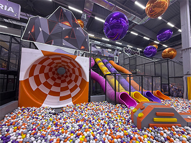 cyberpunk indoor playground ball pit and slides